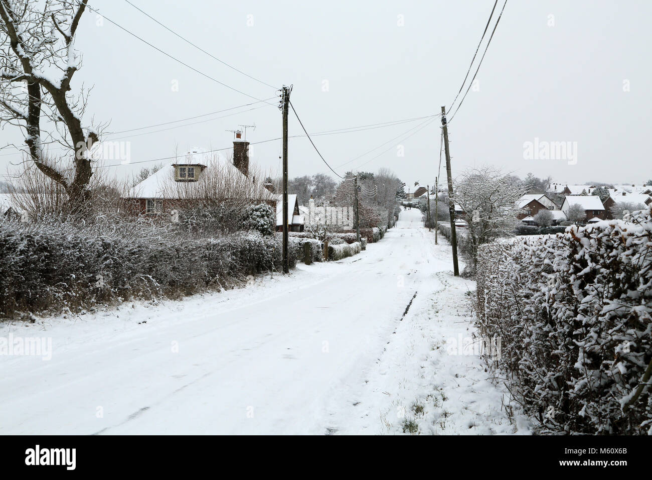 Ashford, Kent. 27th Feb, 2018. UK Weather. Snow covered country road