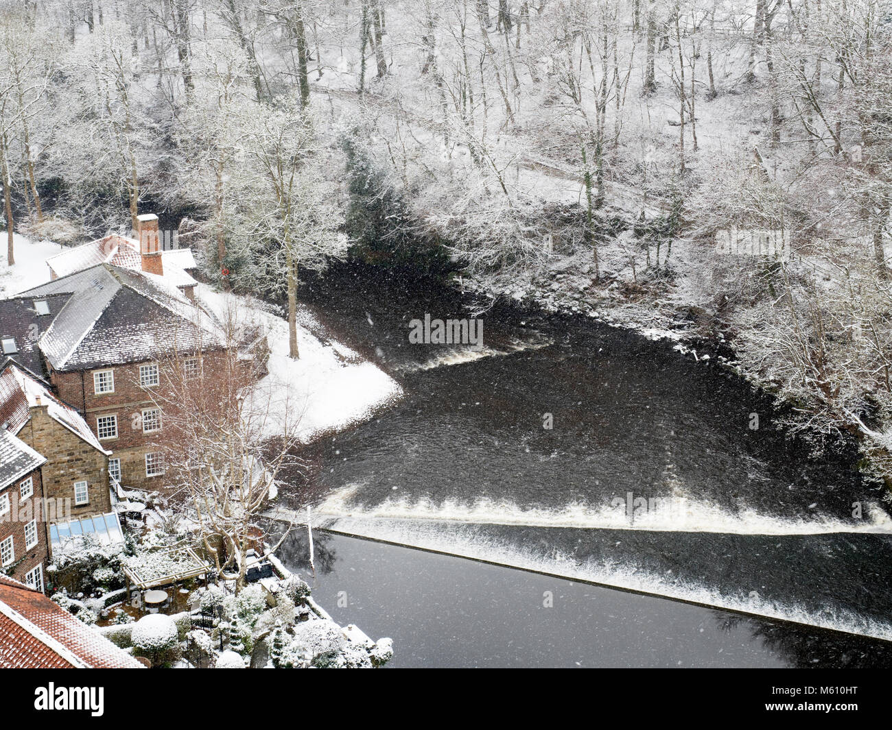Knaresborough, Yorkshire, UK. 27th Feb, 2018. Snow falling at Castle Mills by the River Nidd at Knaresborough North Yorkshire England Credit: Mark Sunderland/Alamy Live News Stock Photo