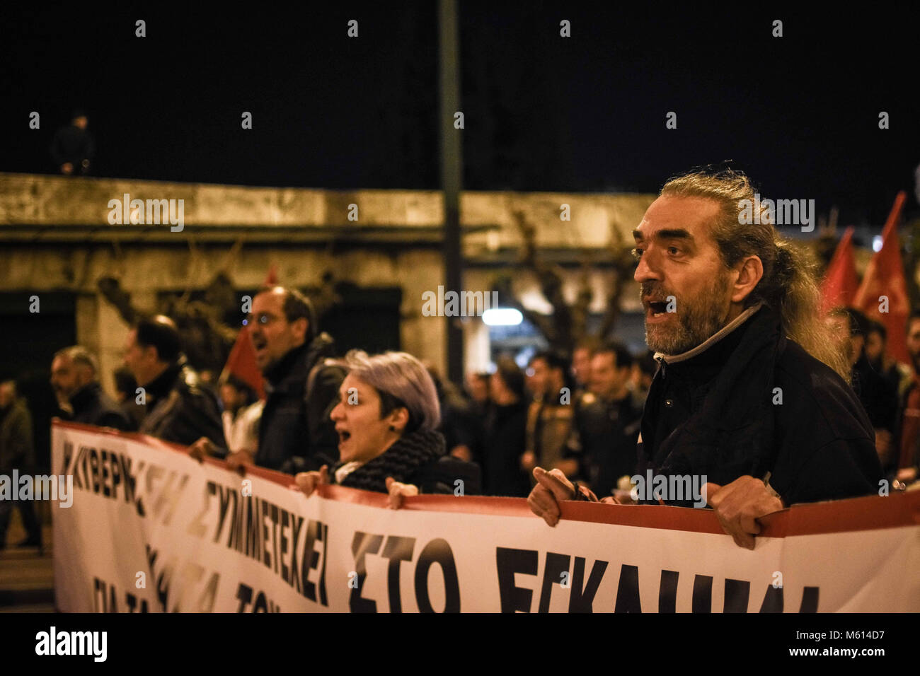Athens, Greece. 27th Feb, 2018. People holding banner and shouting slogans during the demonstration.Demonstration at Syntagma Square in Athens as general secretary of the Communist Party of Greece delivers a speech on developments in the Balkans, the Middle East and the Greek-Turkish relations. Credit: N Kokovlis 27.2.2018 13 .jpg/SOPA Images/ZUMA Wire/Alamy Live News Stock Photo