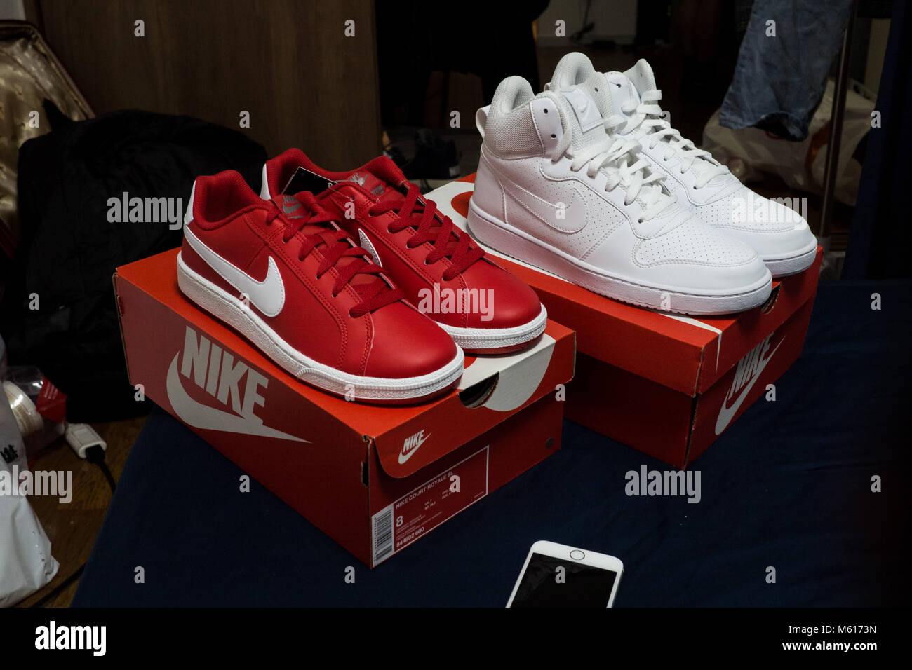 brand new shoes fresh out of the box. Red Nike Walkers, White Nike Tops Stock Photo - Alamy