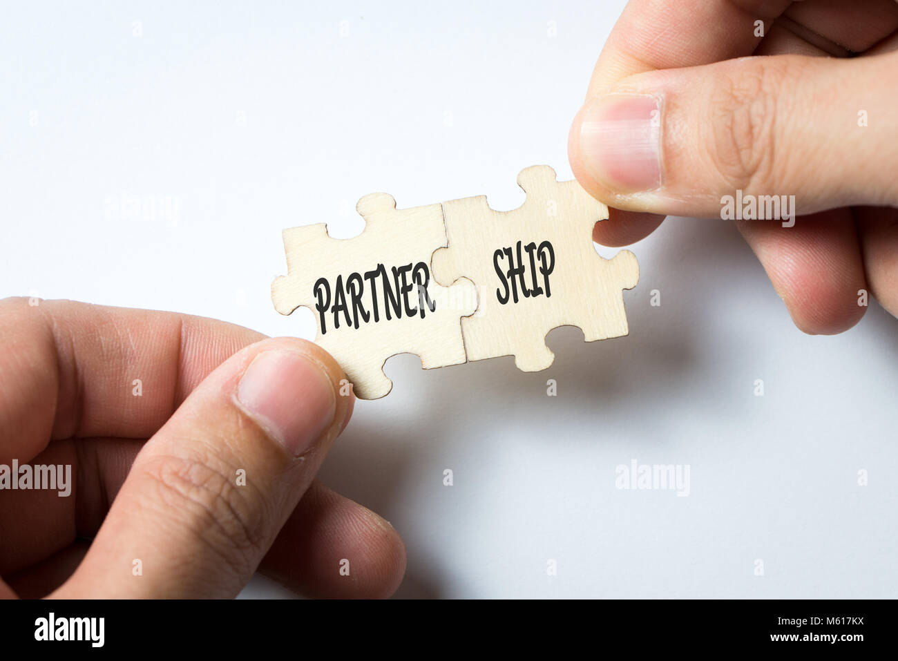 Puzzle pieces with word partnership Stock Photo