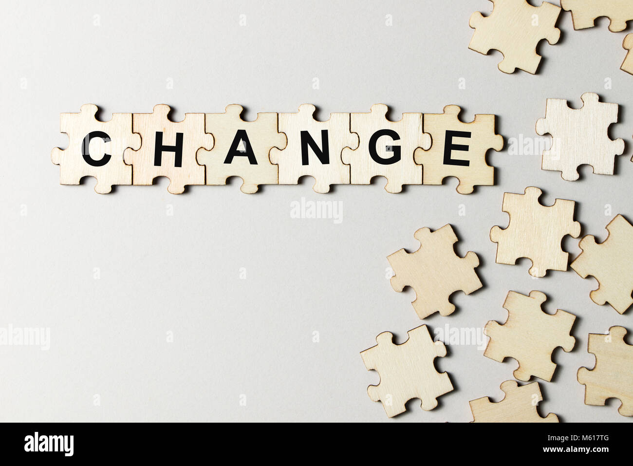 Puzzle pieces with word change Stock Photo