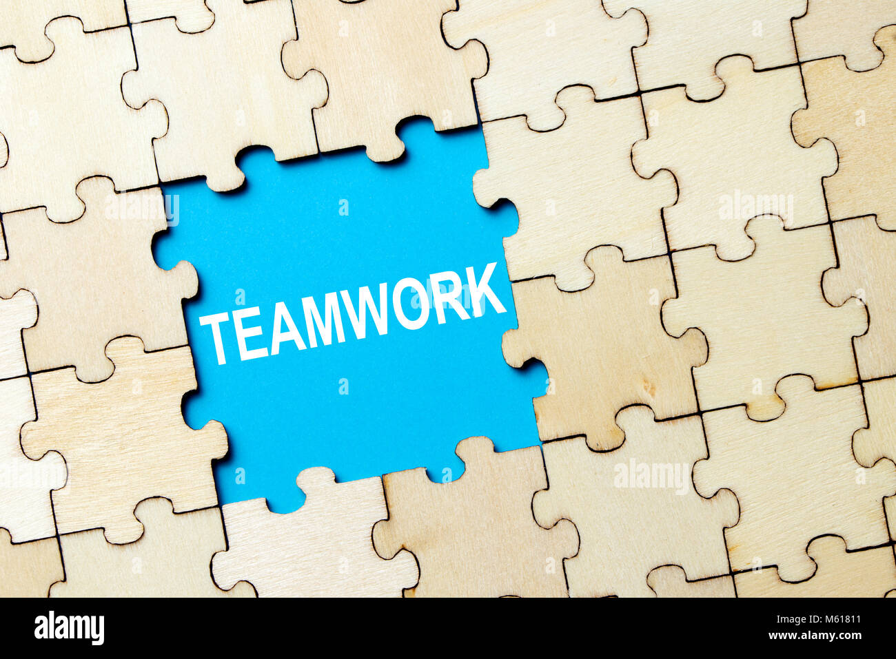 Puzzle pieces with word teamwork Stock Photo