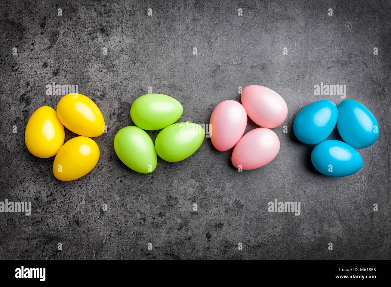 Traditional Easter eggs on a rustic background Stock Photo - Alamy