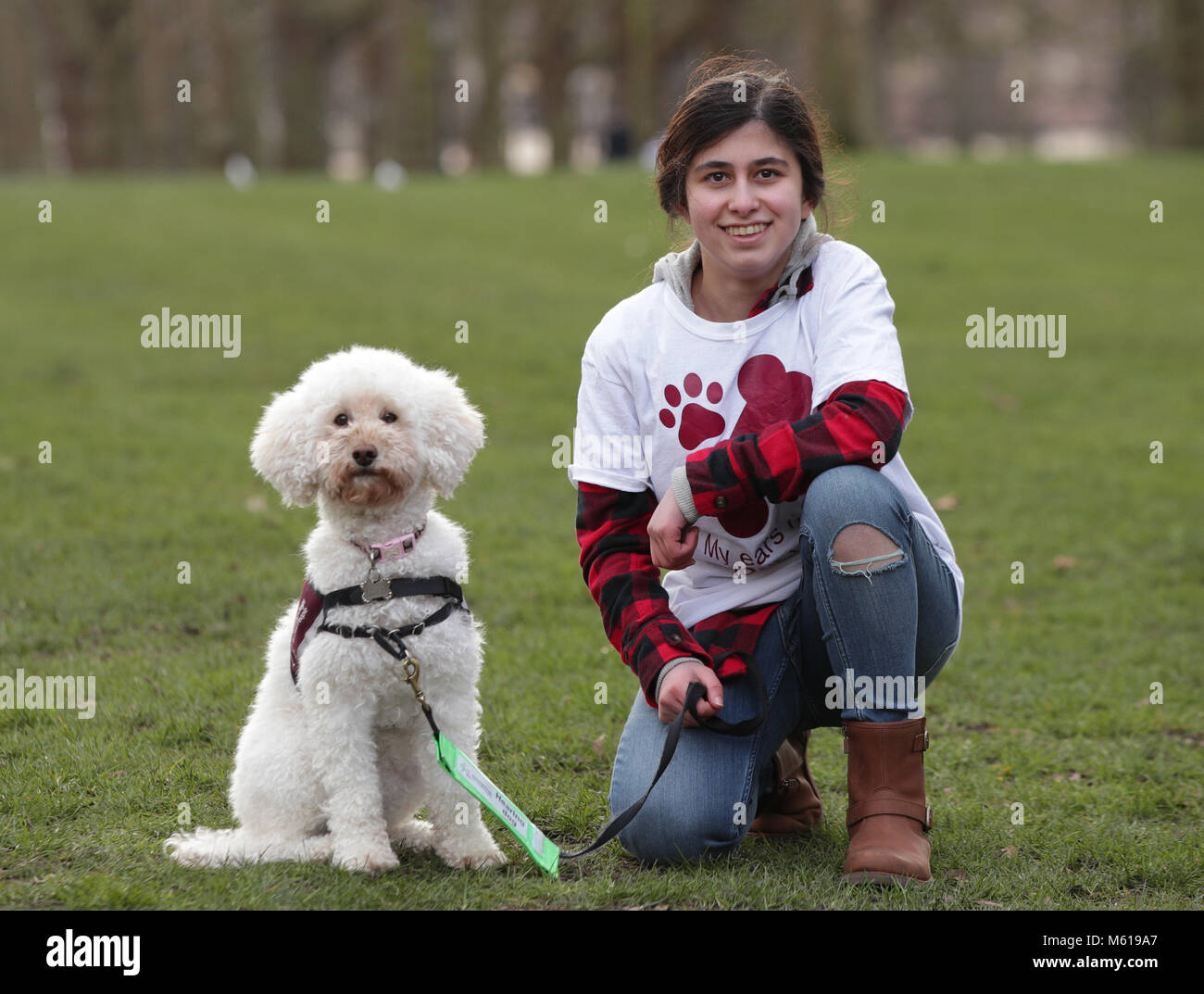 Sarah Mohammadi, 14, from Hayes in west London, with her Cocker Spaniel/Poodle cross Waffle, during a photocall by The Kennel Club in Green Park, London, to announce the finalists for the Crufts dog hero competition, Friends for Life 2018. Stock Photo