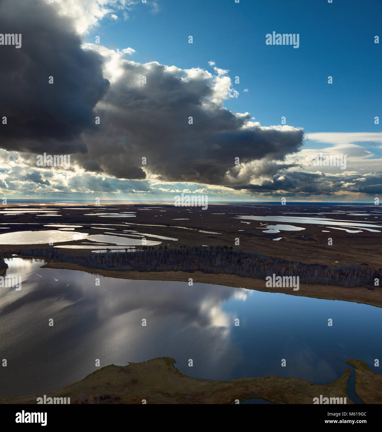 Cloudy day in the tundra in autumn, aerial view. Stock Photo