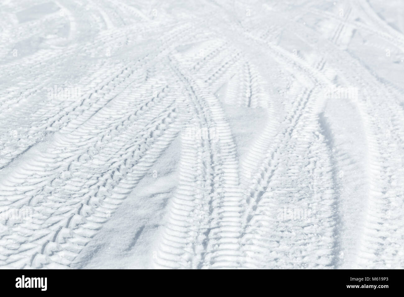 Car tire tracks on winter road. Background photo texture Stock Photo