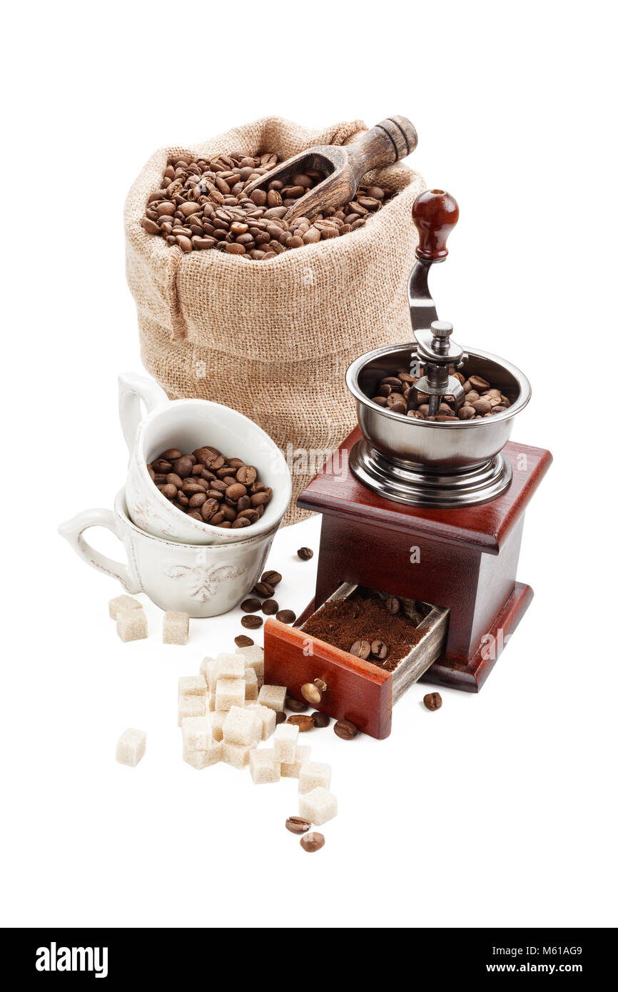 Coffee beans and ground coffee isolated on white background. Stock Photo