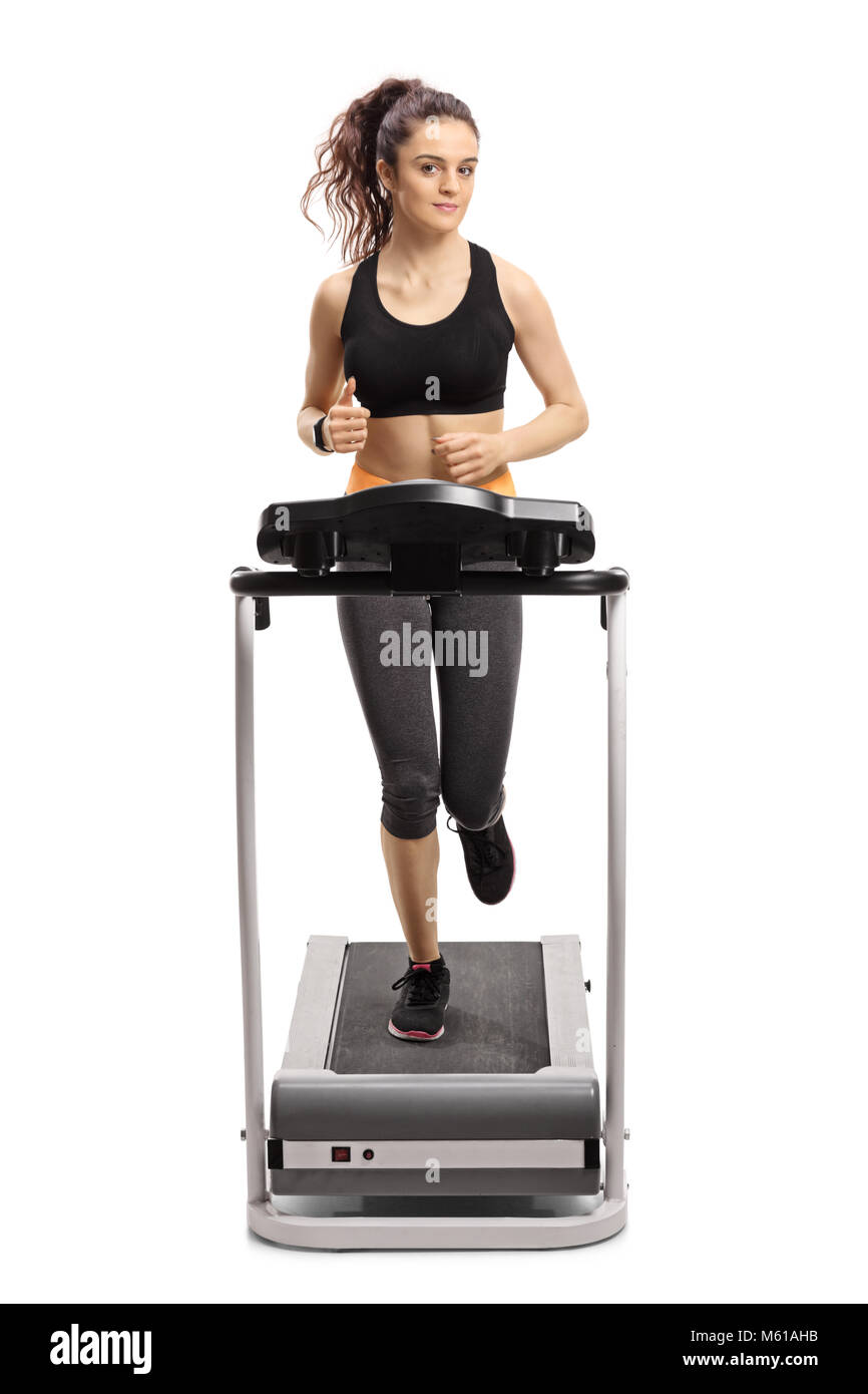 Fitness girl running on treadmill Cut Out Stock Images & Pictures - Alamy