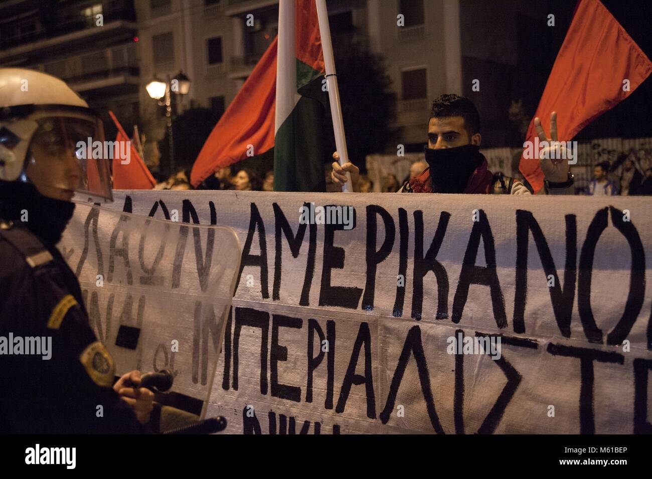 Palestinians and Officer of Greek Riot Police during protest march ...