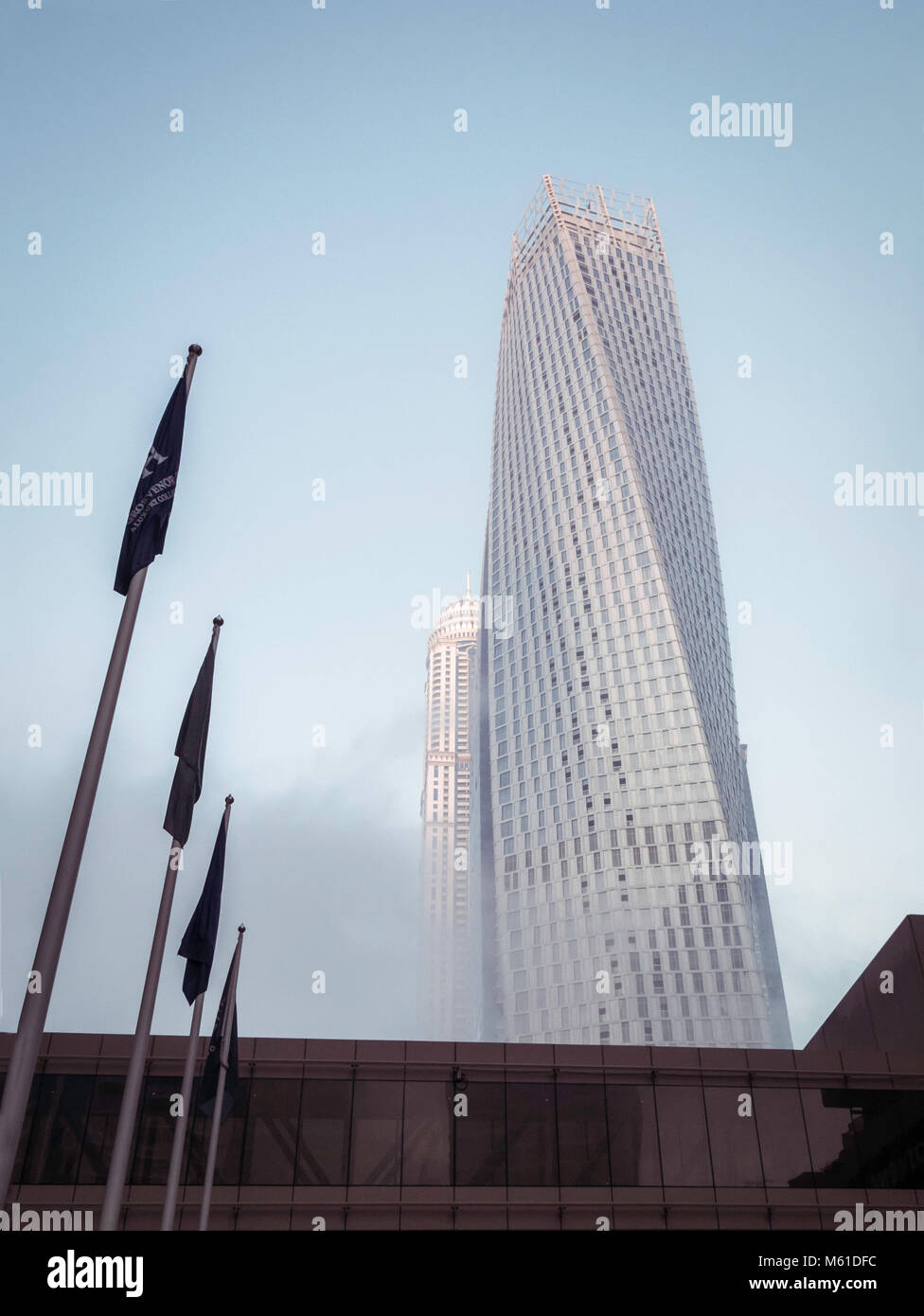 A misty image of the Cayan Tower In Dubai marina United Arab Emirates, Middle East. Stock Photo