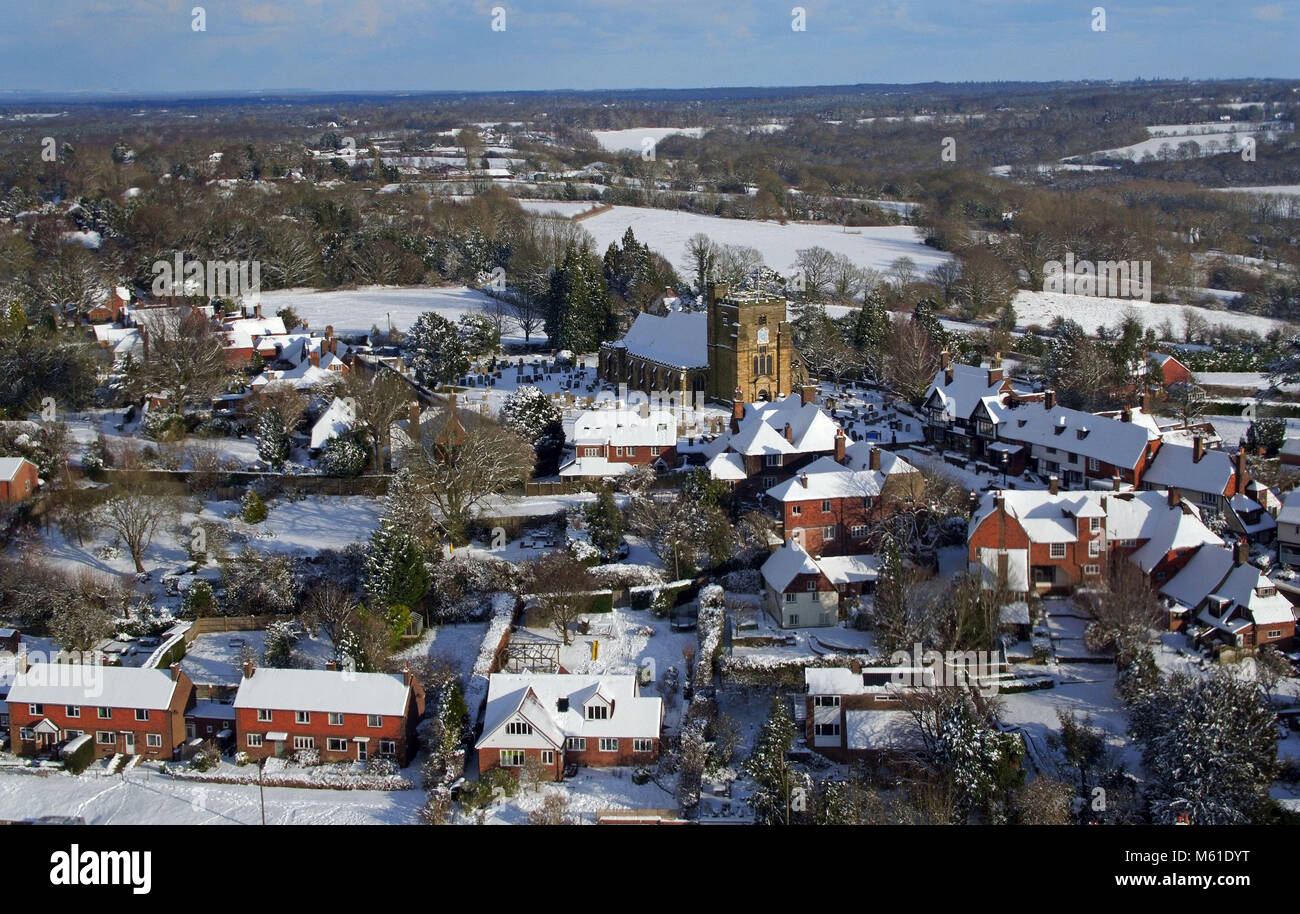 A view of St. Mary's Church in Goudhurst, Kent, as heavy snowfall is affecting roads across the UK after several centimetres fell in some parts over the night. Stock Photo