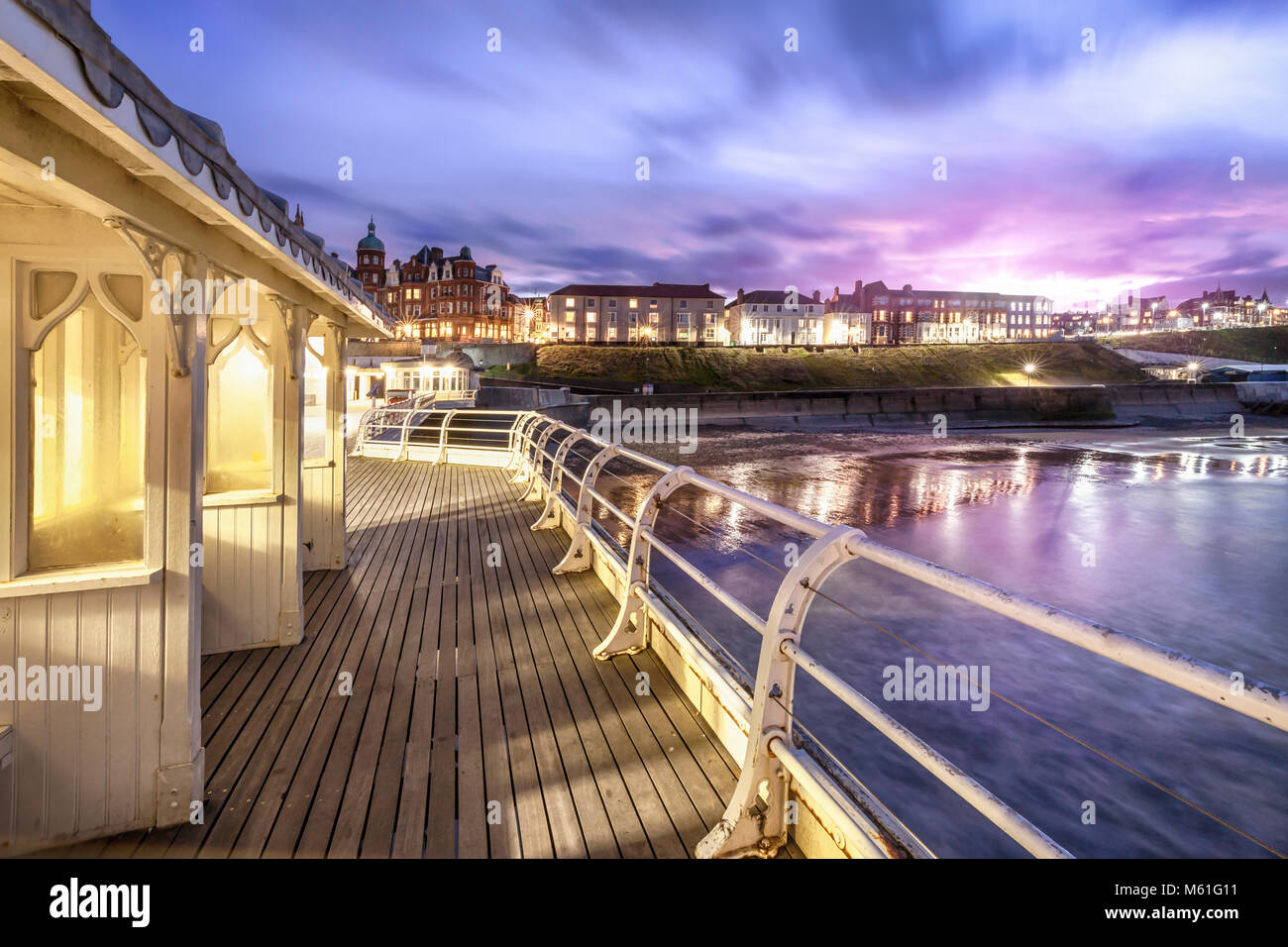 Cromer Pier Victorian Shelters - One of the greatest piers in England jutting out from Cromer town in Norfolk. The Pier is a Grade II listed building Stock Photo
