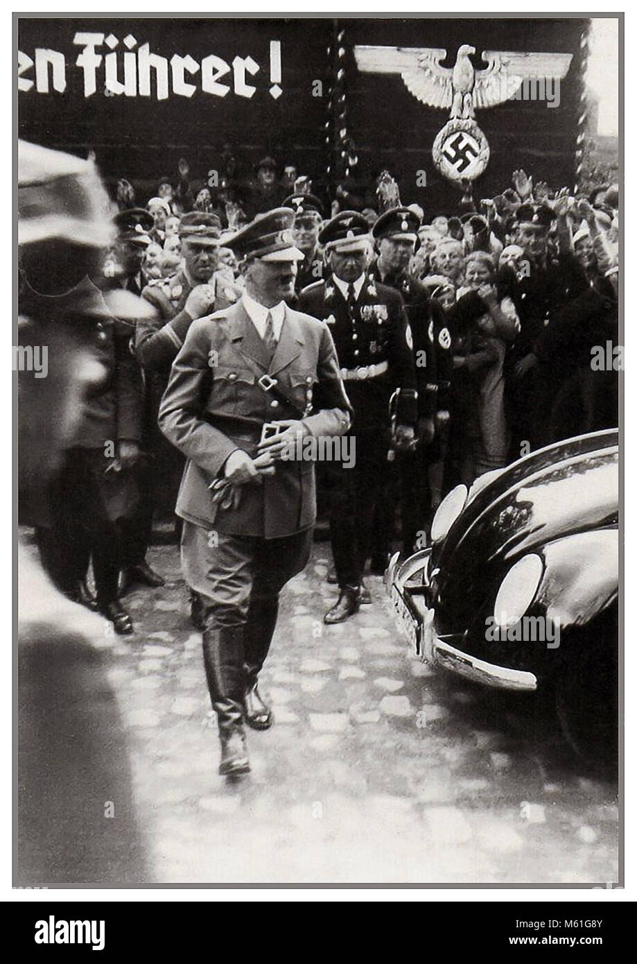 1930's ADOLF HITLER  at the launch of 'the people's car' KDF VW Volkswagen Beetle prototype convertible air-cooled motorcar at Fallersleben Wolfsburg Germany May 1938 Stock Photo