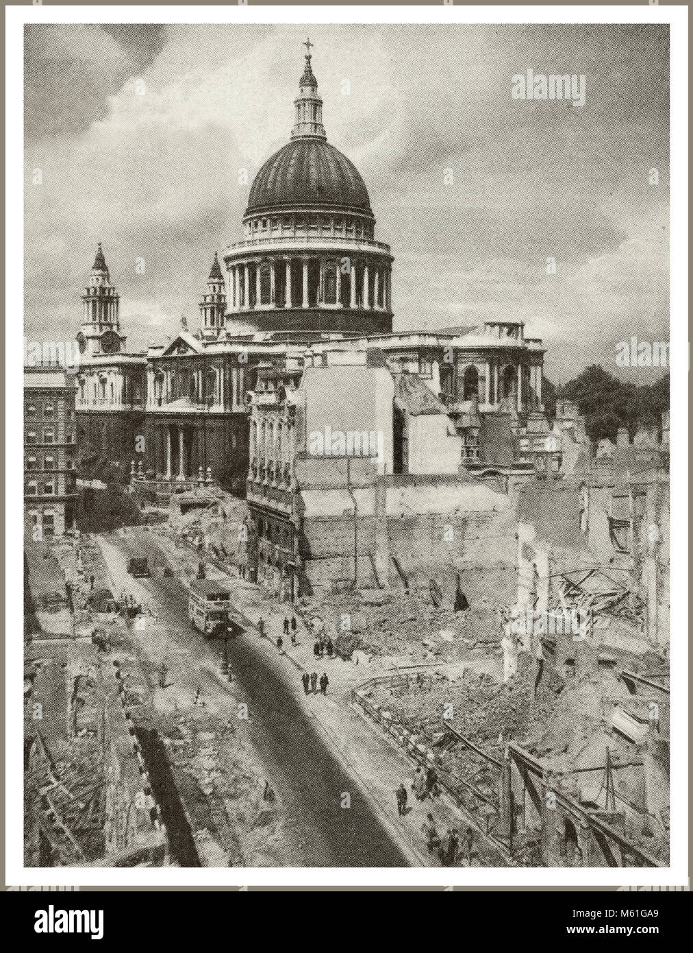 WW2 Saint Pauls Cathedral London Blitz surrounded by bombed out buildings in close proximity, after the Nazi Luftwaffe Blitz of 29th/30th December 1940 where St. Pauls Cathedral emerged remarkably unscathed and subsequently became a symbol of resistance during the World War II Second World War London Blitz bombings Stock Photo