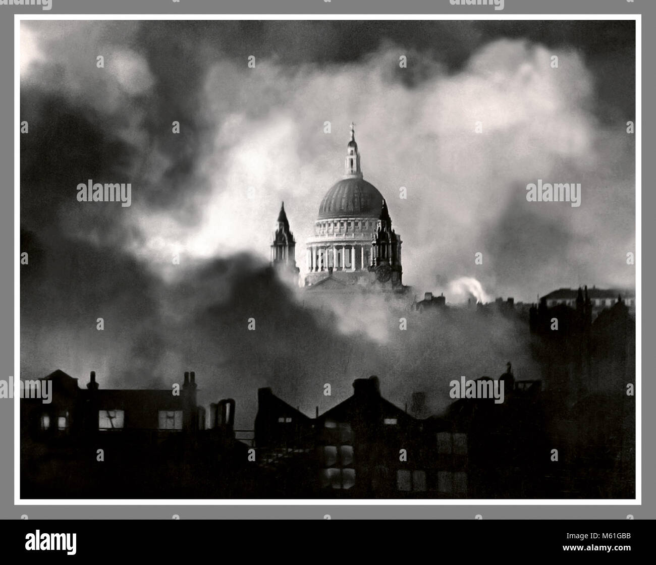 LONDON BLITZ WW2 SAINT PAULS CATHEDRAL NAZI GERMANY BOMBING St Paul's Survives. An iconic photograph of Saint Pauls Cathedral pre-planned and bravely taken in a night air raid 29/30th December 1940 by photographer Herbert Mason. This image became the symbol of resistance against the Nazi Germany Luftwaffe terror bombing of civilians. This photograph has been carefully restored and enhanced to re-create its original impact and quality. Stock Photo