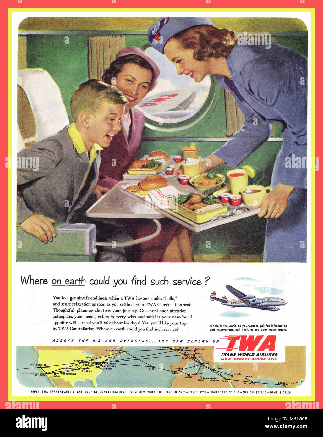 AIRLINE TRAVEL FOOD SERVICE TRAY TWA 1950's Vintage Historic Archive Aviation Airlines Press Advertisement for TWA illustrating a happy boy child passenger being served with an airline food tray Stock Photo