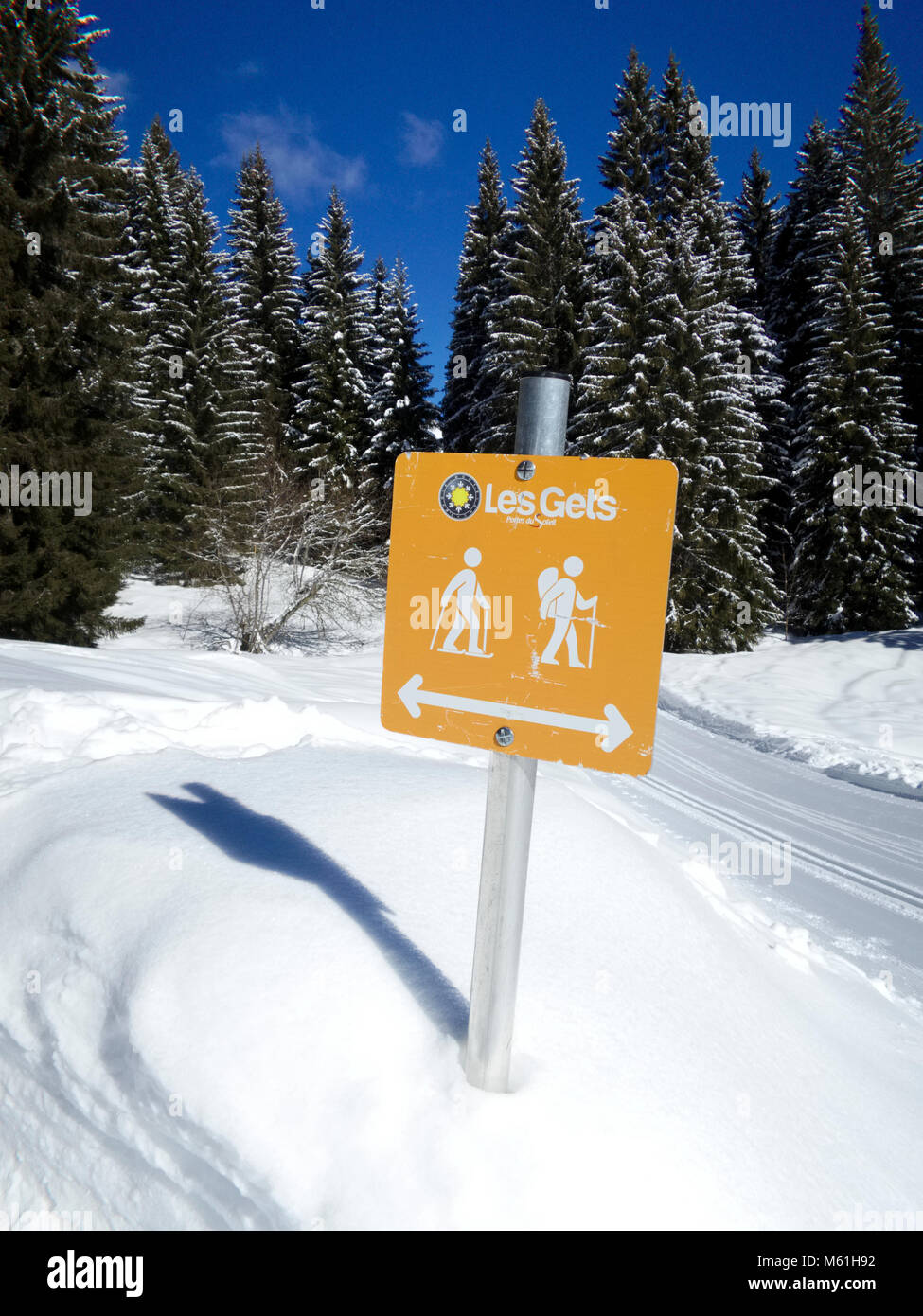 A sign for walking and snowshoeing trails at Mont Caly in the Les Gets  ski area of the Portes de Soleil in the Haute Savoie region of the French Alps Stock Photo