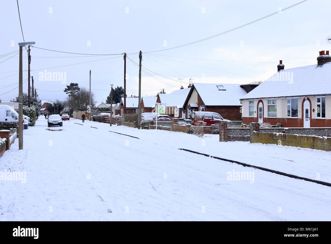 Snow on the bungalows, pavements and roads of Kesgrave Suffolk during