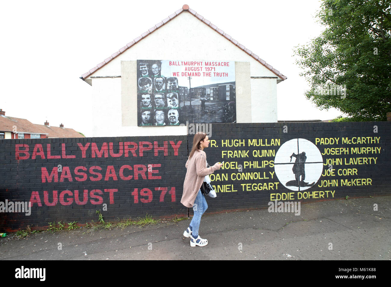 Murals dedicated to the 1971 Ballymurphy Massacre seen on a wall in ...