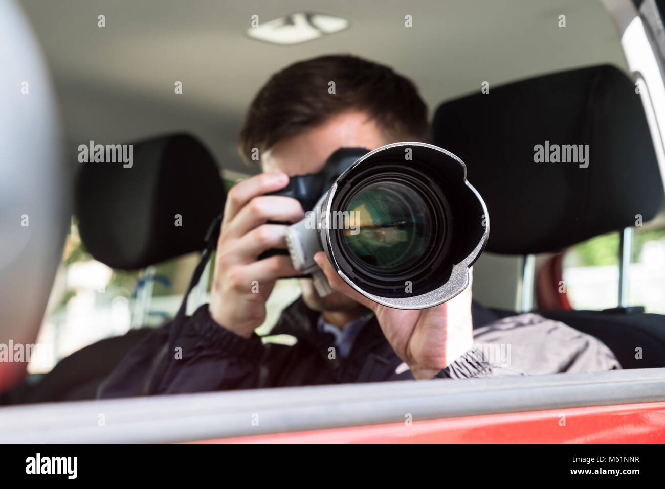 Side view hand camera lens hi-res stock photography and images - Alamy