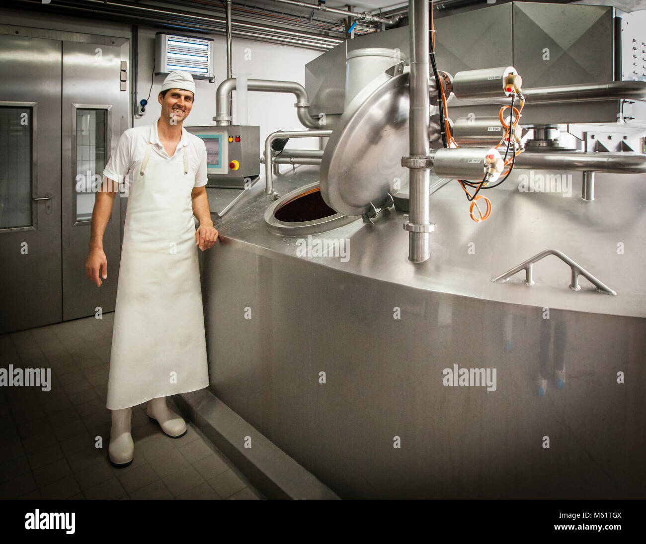 CheeseFactory in Hittisau, Austria. His job Dairy and cheese maker
