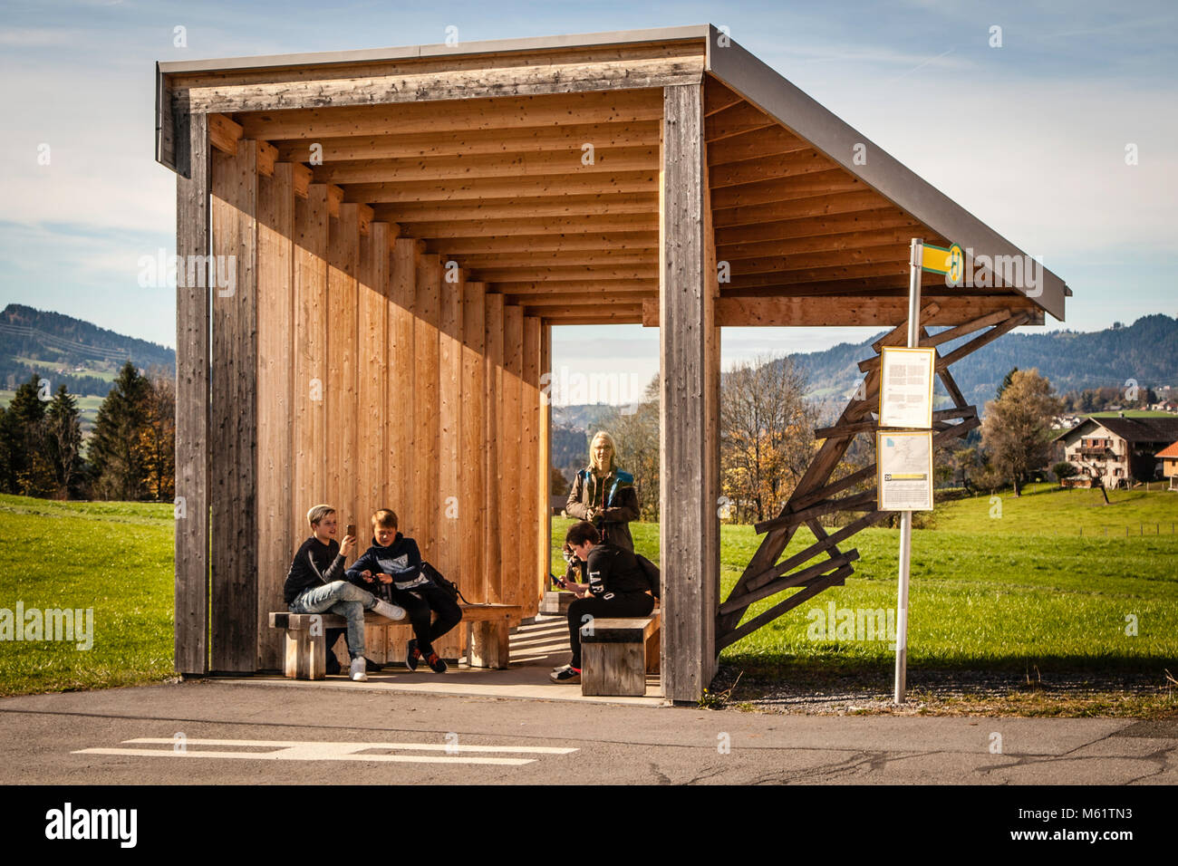 BUS: STOP Glatzegg, designed by Amateur Architecture Studio, China. Krumbach bus shelters designed by architects from all around the world, drawing attention to everyday mobility service. Bregenzerwald Austria.Wang Shu and Lu Wenyu, Pritzker Prize winners, China. This BUS: STOP has a clear view on both sides. The architects create a space that sharpens the focused perception of the landscape. BUS:STOP Krumbach, Vorarlberg, Austria Stock Photo