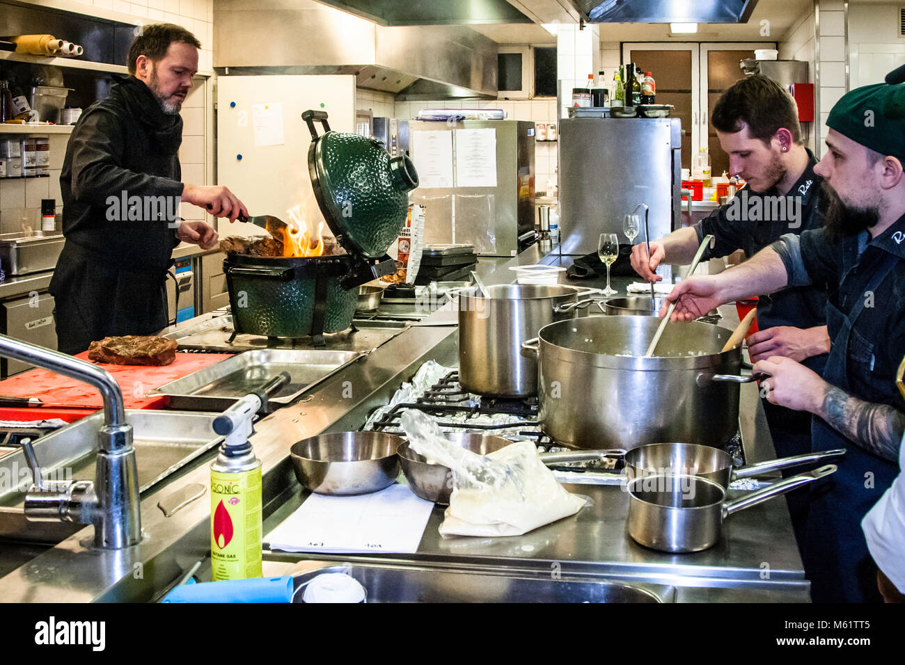 German Michelin star chef Marco Müller and his team Stock Photo