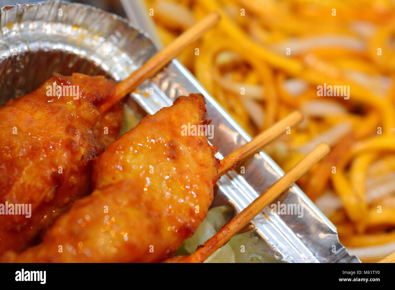 Chicken Satay & Chow Mein noodles takeaway food Stock Photo Alamy