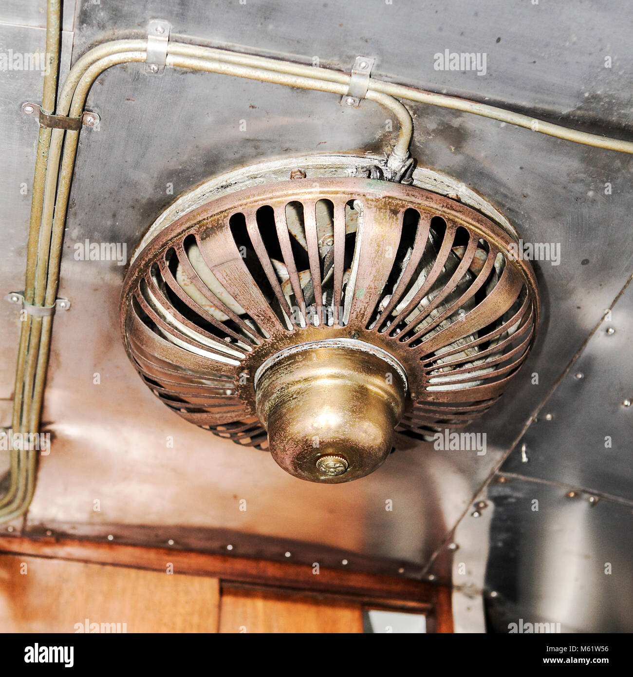 One of (26) images in this set revealing external and especially internal aspects of steam locomotive travel in Britain. Extractor fan in kitchen. Stock Photo