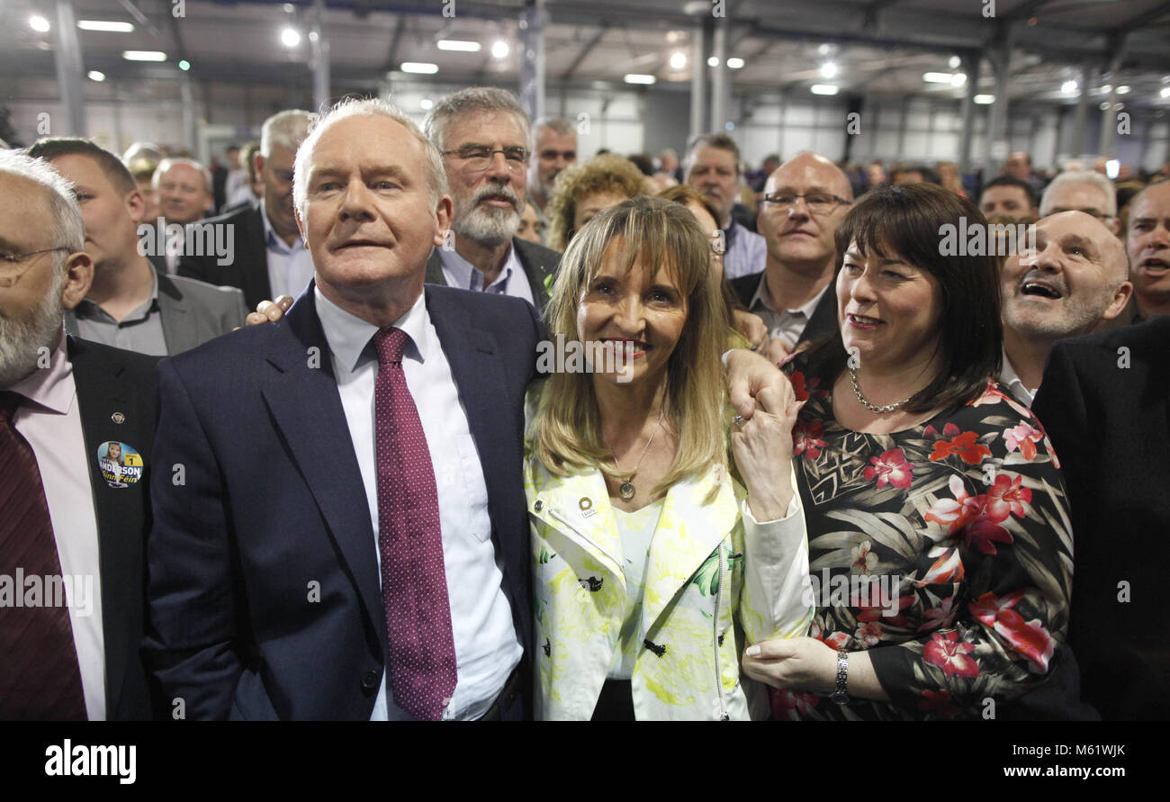 Sinn Fein's Martina Anderson, centre awaits the results with party members Michelle Gildernew, right, and Martin McGuinness and Gerry Adams at the Kings Hall count centre, Belfast, Northern Ireland, Monday, May 26, 2014. Anderson topped the poll in the European elections for Northern Ireland, She polled 159,813 votes, beating the quota by over 3,000 votes to become the first of Northern Ireland's MEP's. Photo/Paul McErlane Stock Photo