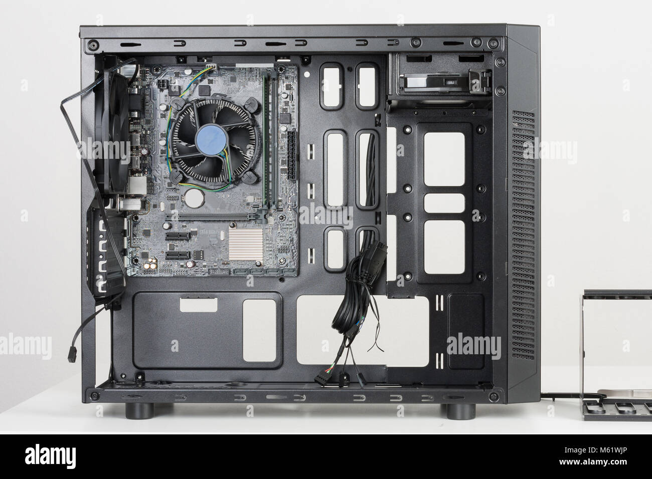 Building of PC, ATX motherboard inserted to black computer midi tower case  Stock Photo - Alamy