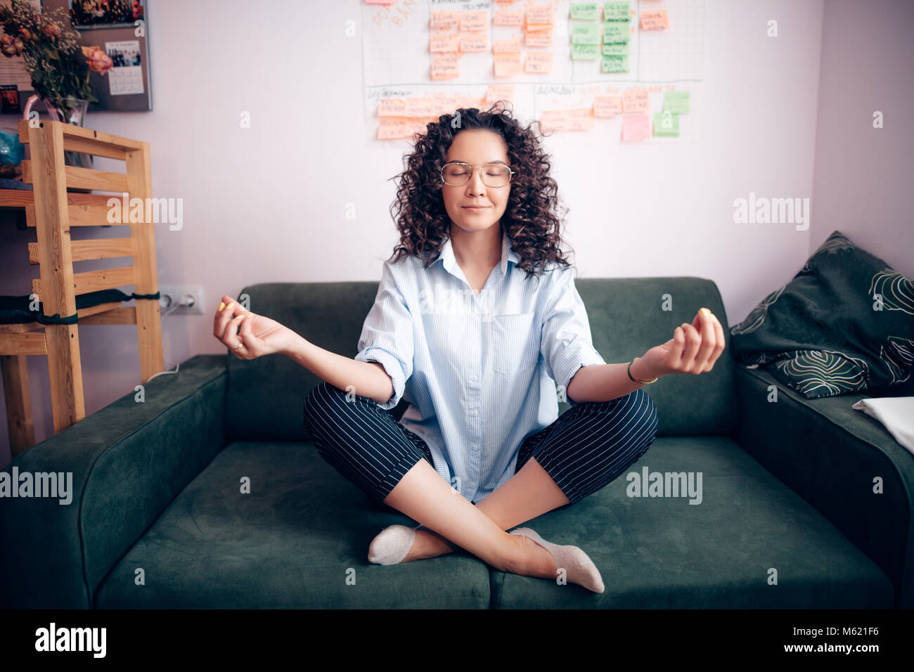 Slim Woman With Dark Curly Hair Relaxing After Hard Working Day