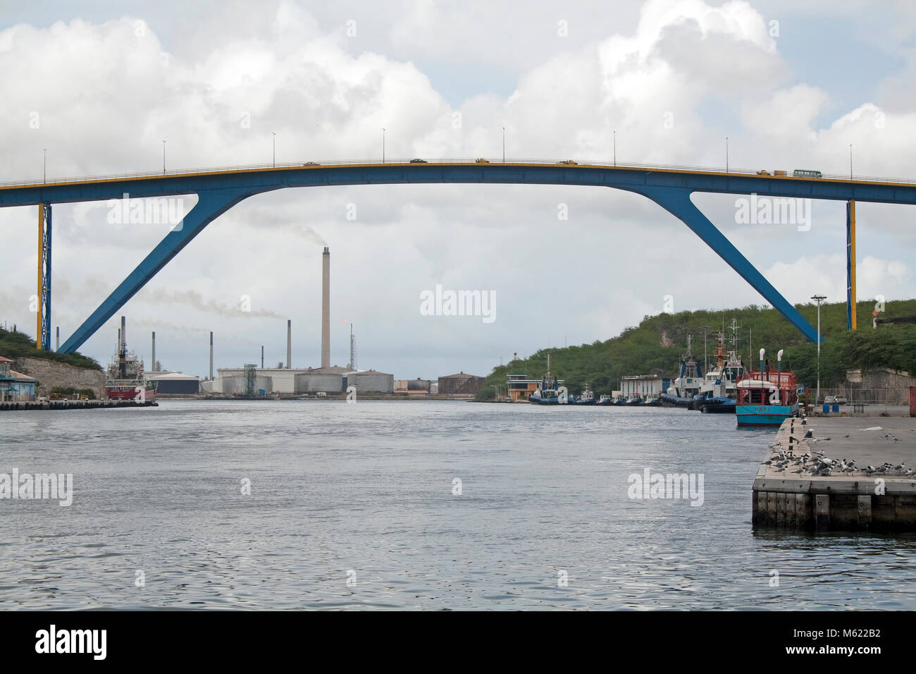 Queen-Juliana bridge, behind the Oil refinery, Willemstad, Curacao, Netherlands Antilles, Caribbean Stock Photo