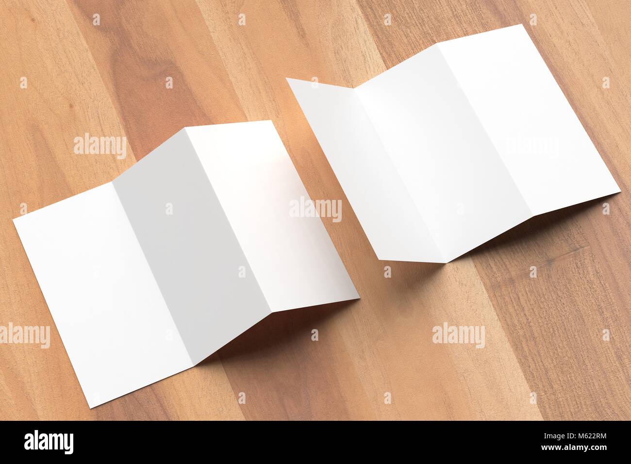 Thrifold - Three fold brochure mock up on wooden background. 3d illustrating Stock Photo