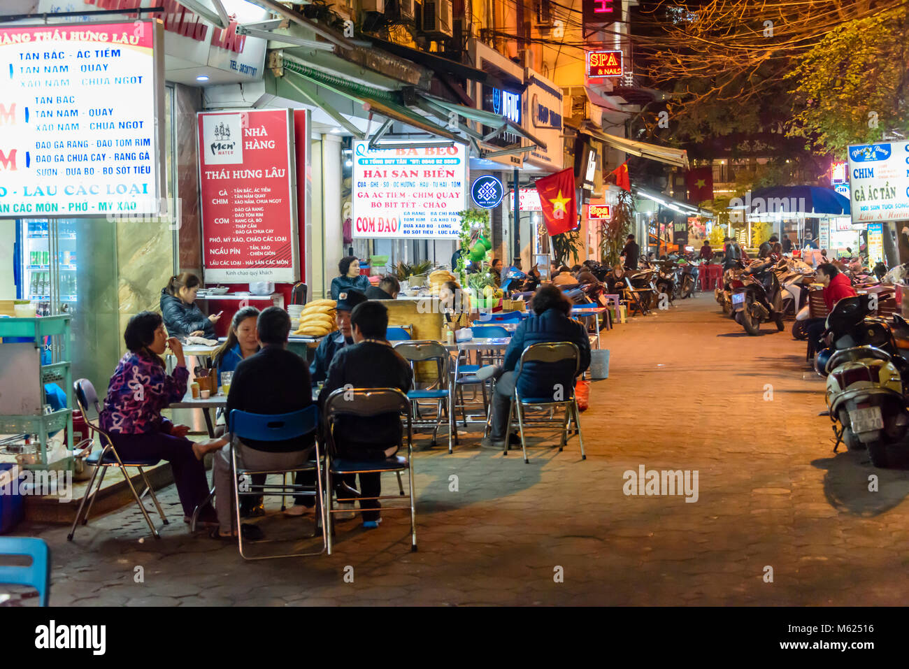 Lots of street restaurants in Hanoi, Vietnam. Stock Photo