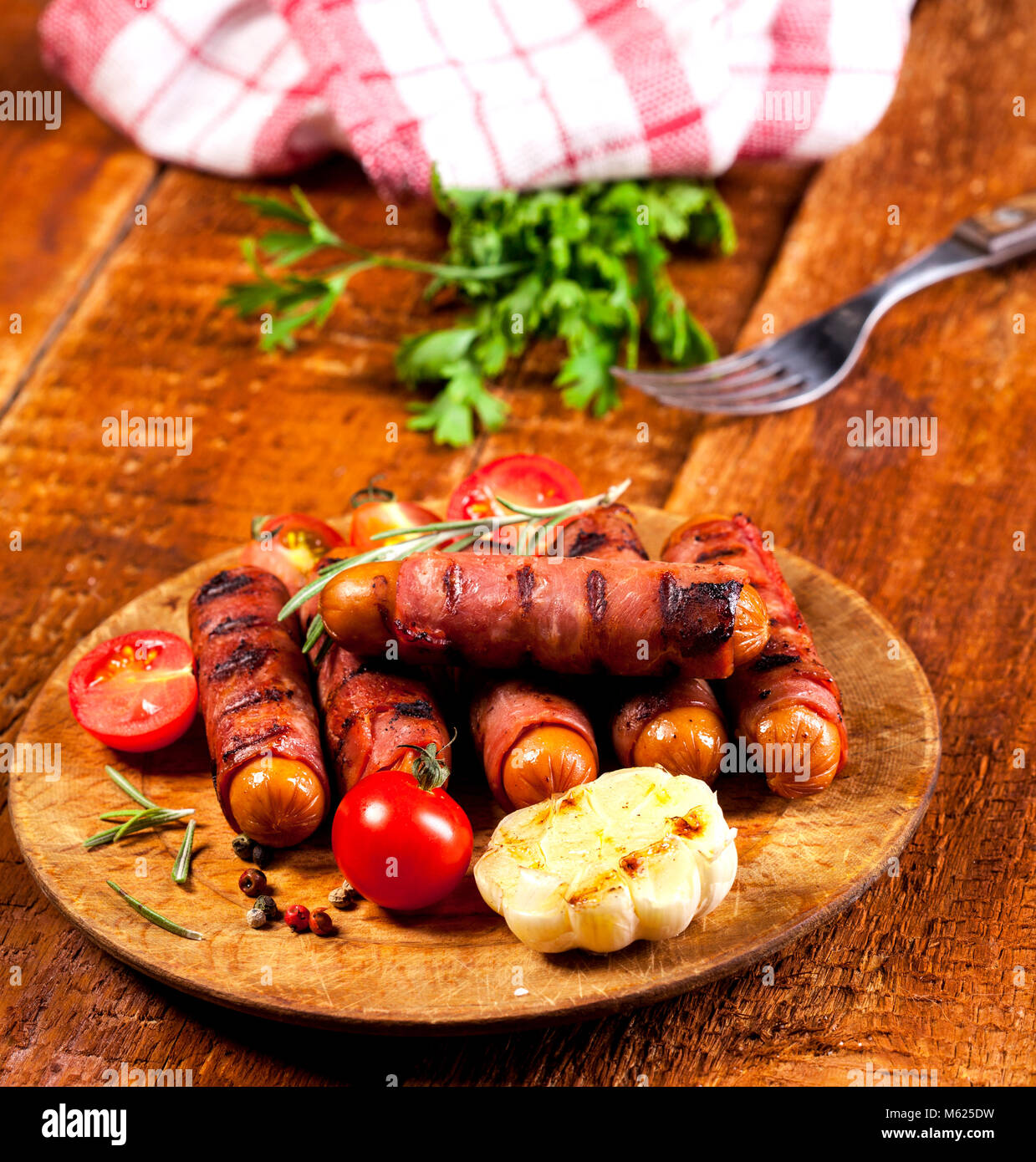 Festive cocktail sausages wrapped in crispy smoked bacon commonly known