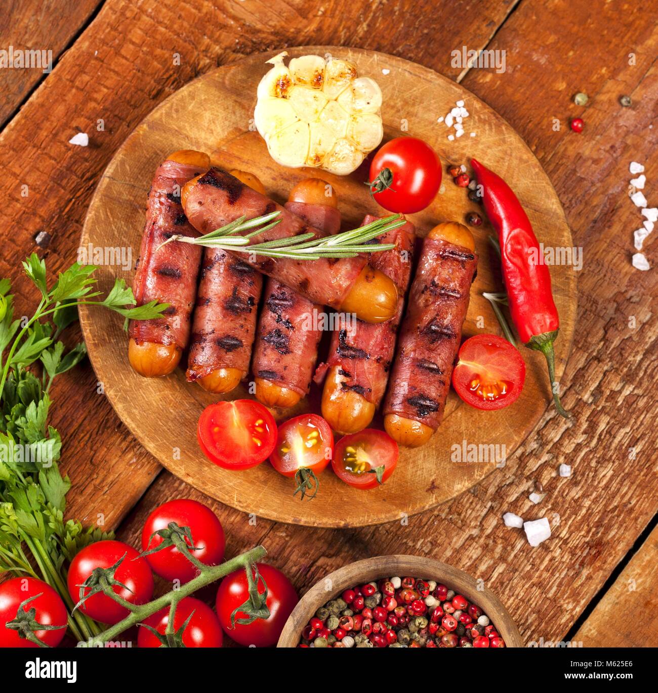 Festive cocktail sausages wrapped in crispy smoked bacon commonly known