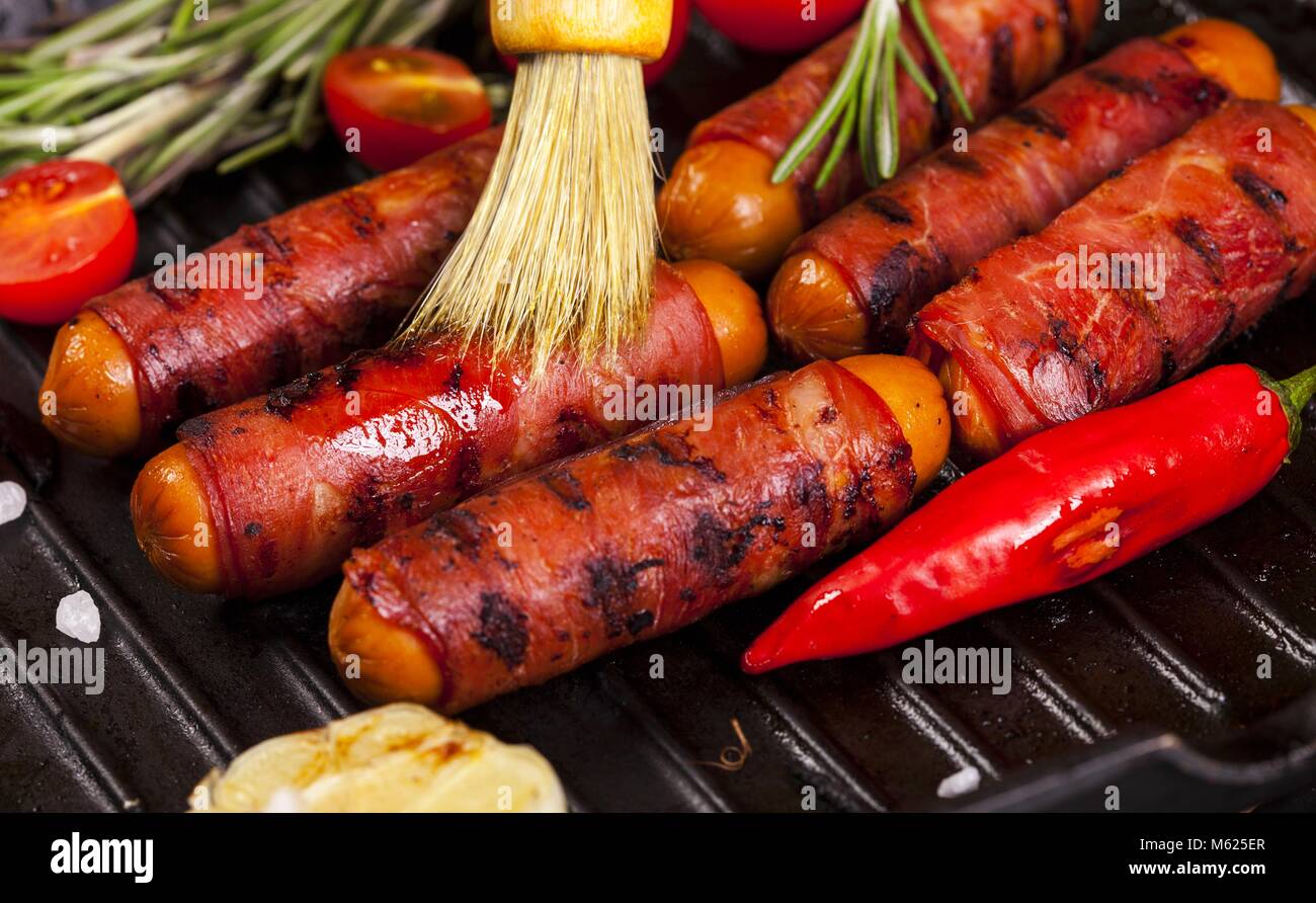 Festive cocktail sausages wrapped in crispy smoked bacon commonly known