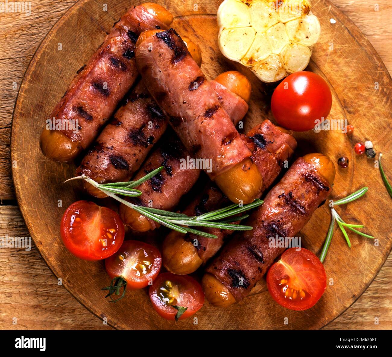 Festive cocktail sausages wrapped in crispy smoked bacon commonly known
