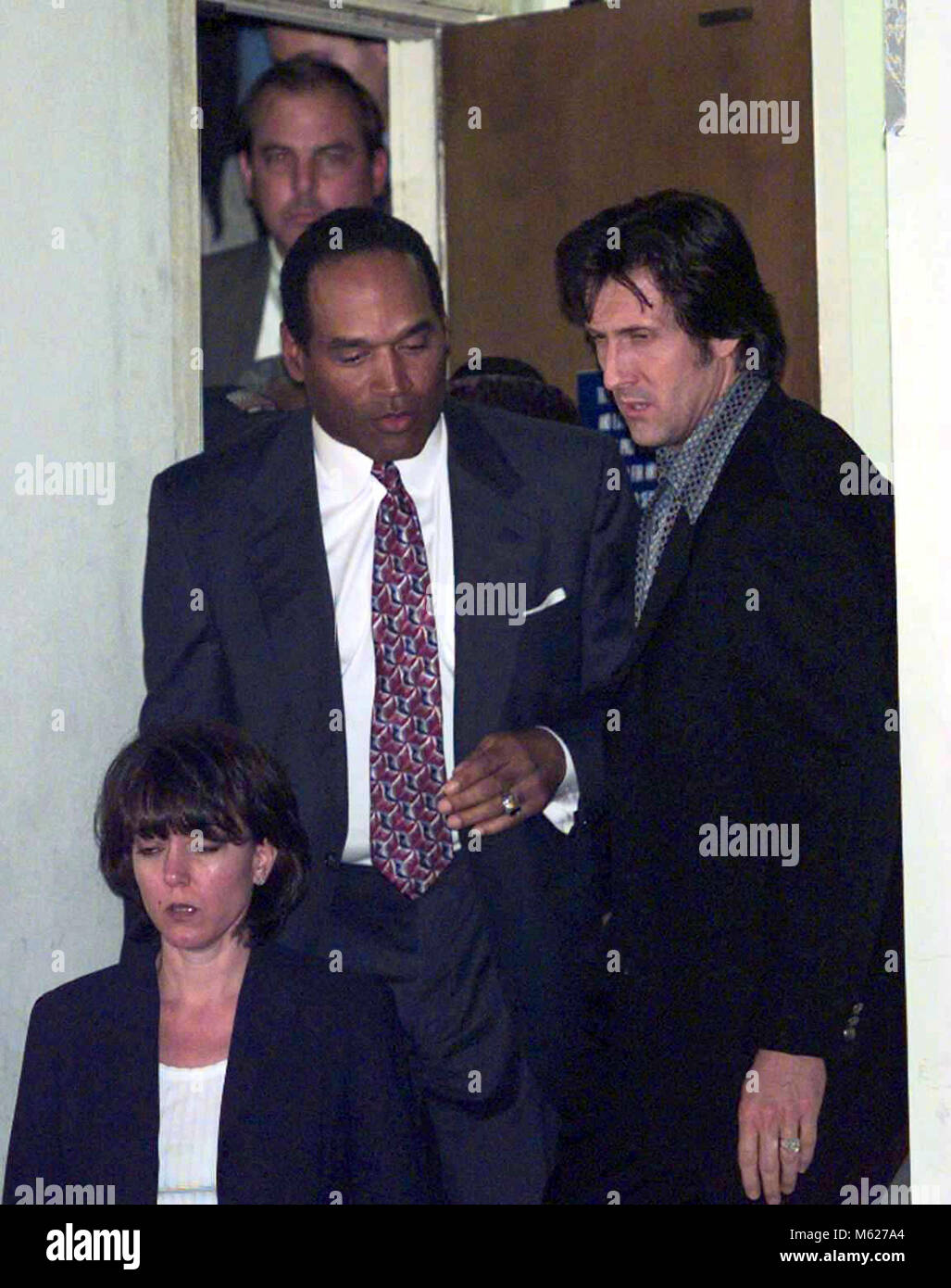 O.J. Simpson leaves the Santa Monica County Courthouse after the verdict for the civil trial for the death of Ron Goldman and Nicole Brown Simpson on February 4, 1997. Photo by Francis Specker Stock Photo