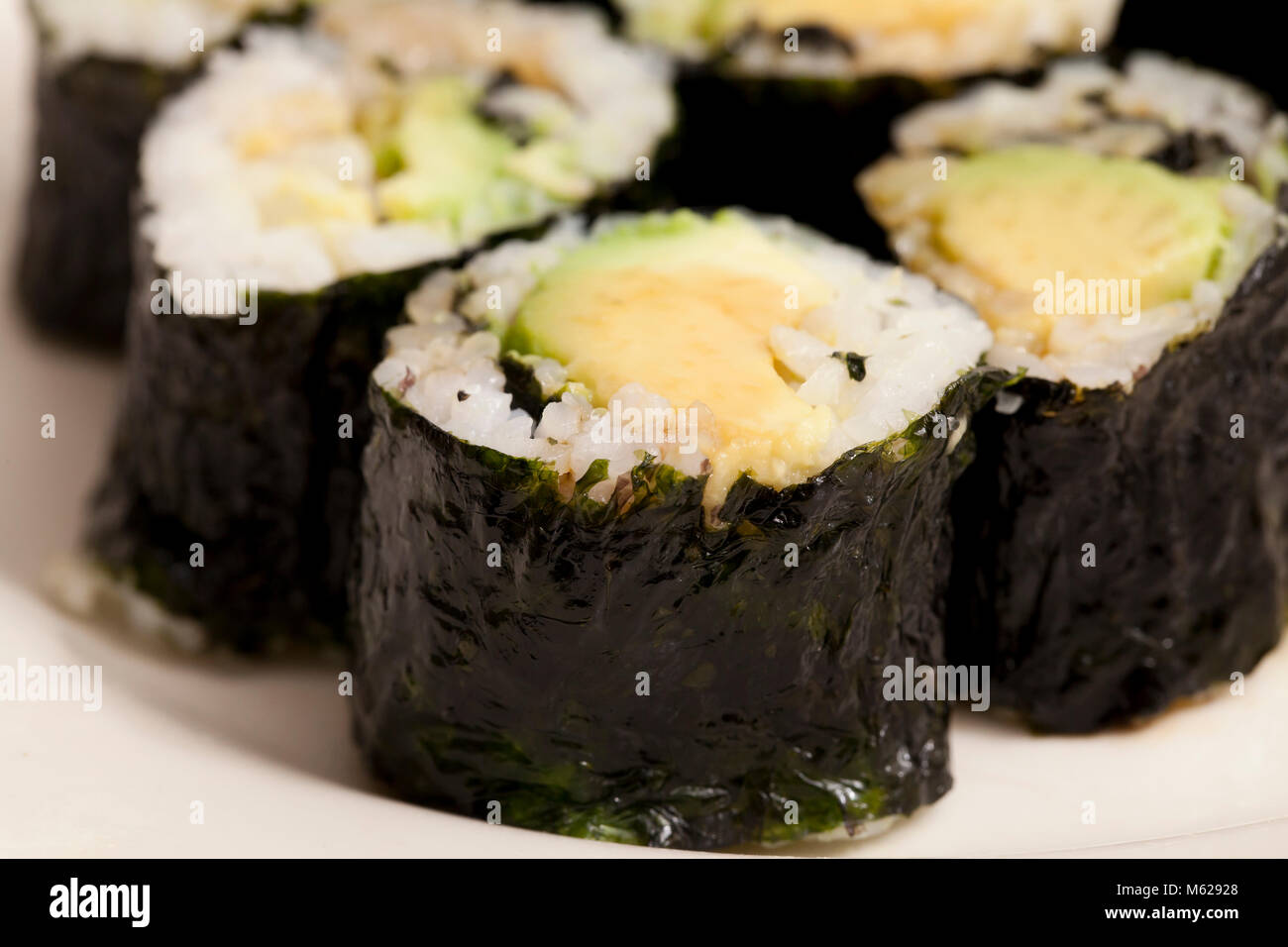 Avocado roll sushi on plate Stock Photo