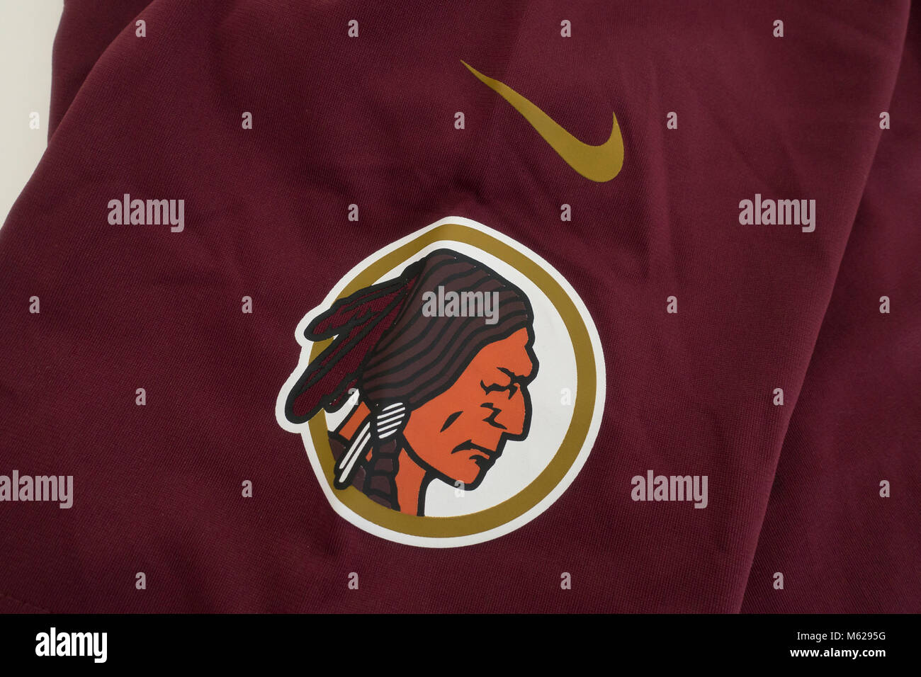 The Native American mascot logo on a Washington Redskins football jersey - USA Stock Photo