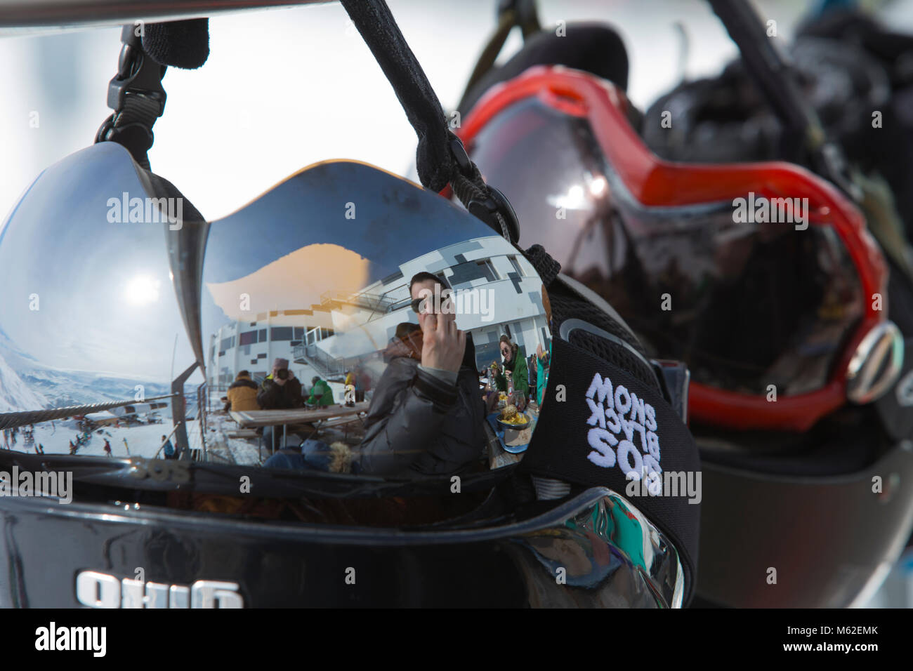 reflection off ski helmet in Switzerland Stock Photo