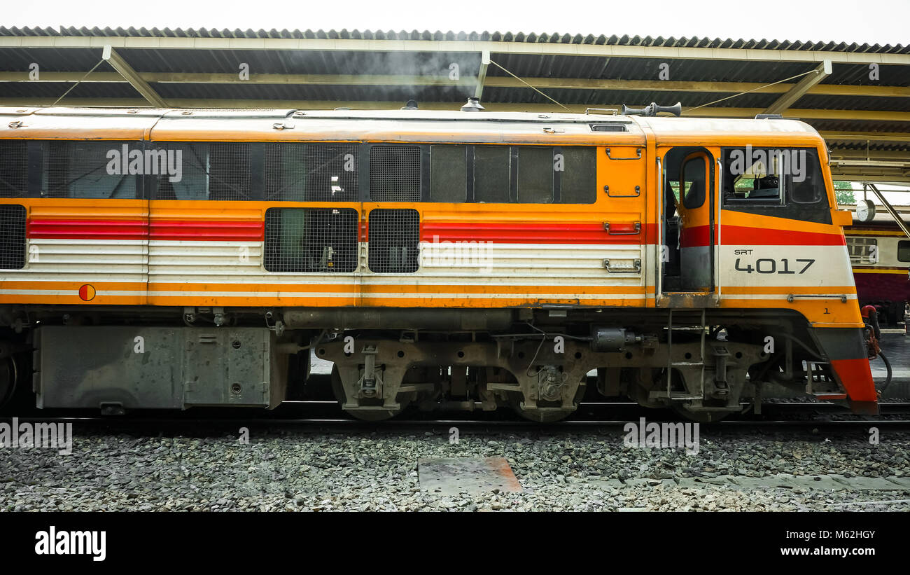 Old diesel train running for reconnect at a platform of railway station