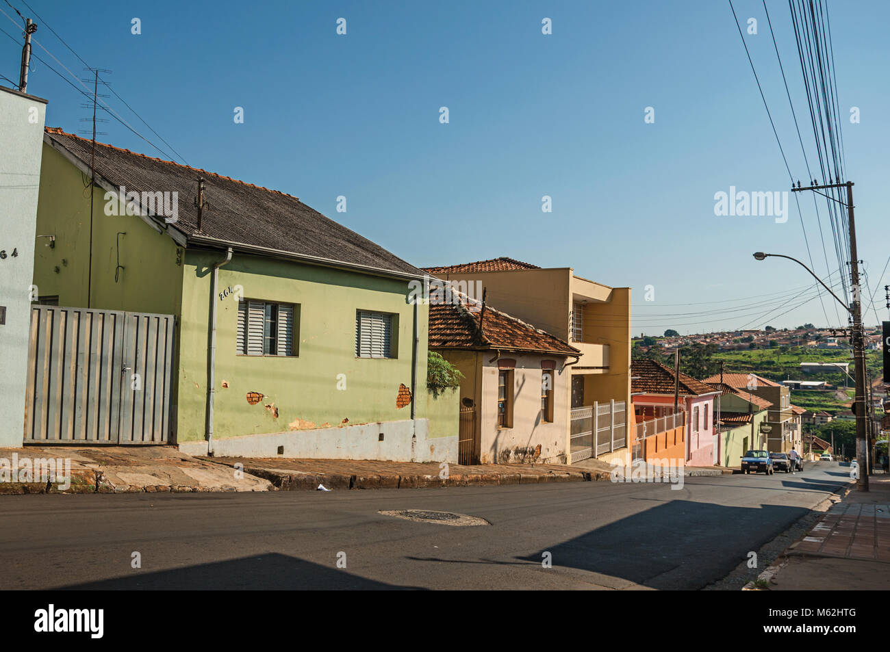 São Manuel, southeast Brazil. Downhill street view with sidewalk walls