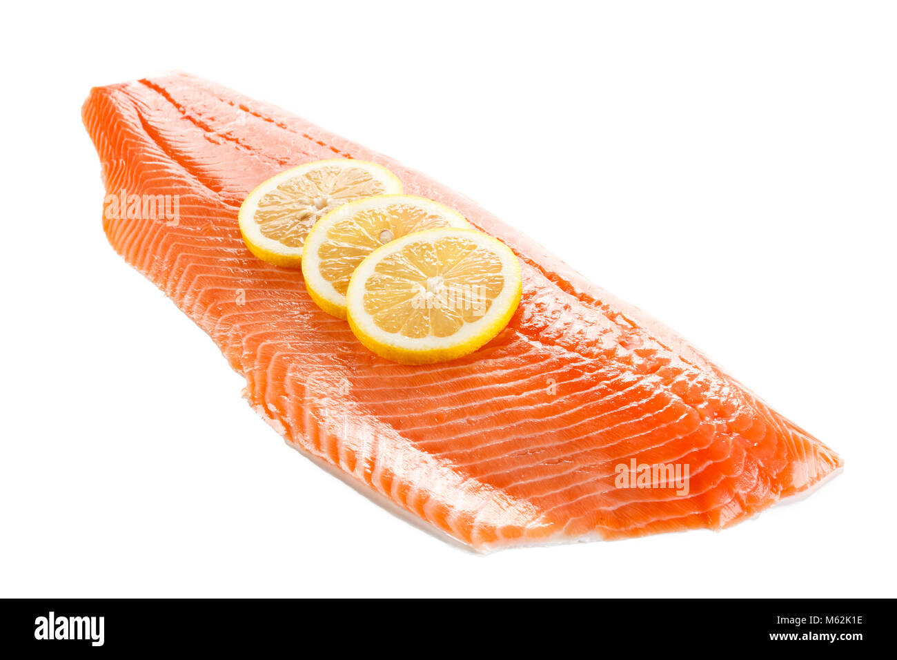 Raw salmon fillet on white background Stock Photo - Alamy