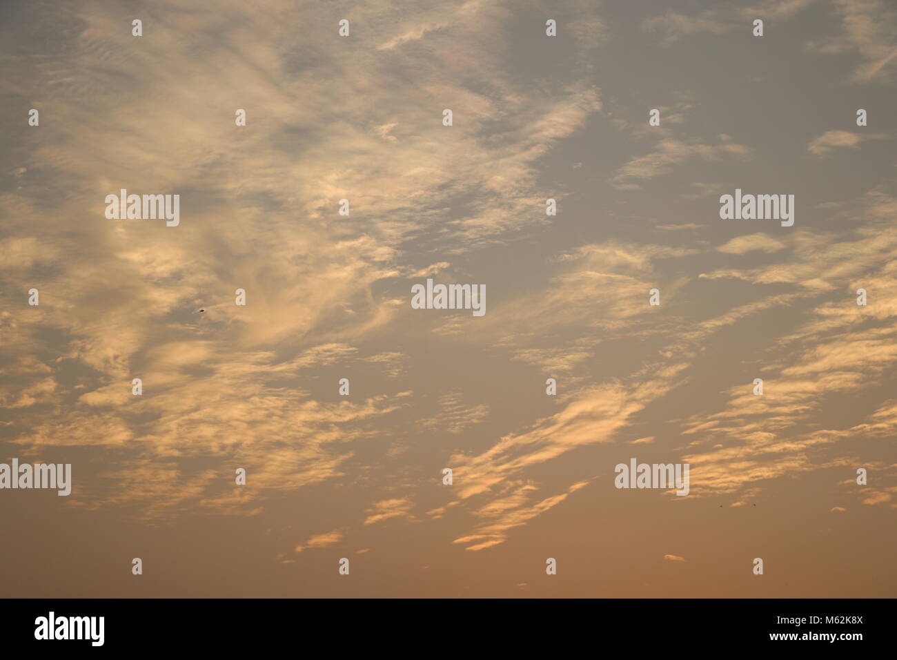 golden and blue sky with clouds during because of sunset Stock Photo ...