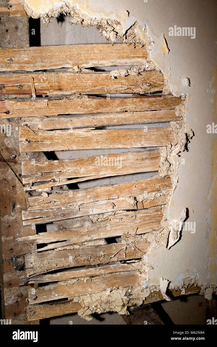 Traditional lath and plaster wall with horse hair in old Cotswold farm house UK Stock Photo