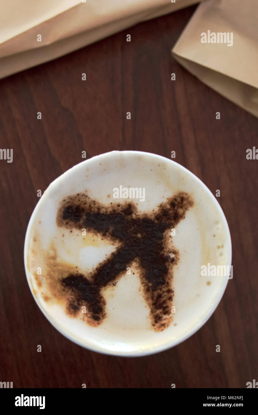 Shaped airplane in the cappuccino cup. Dubai, United Arab Emirates. Stock Photo